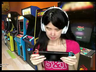 Topless asian gamer girl